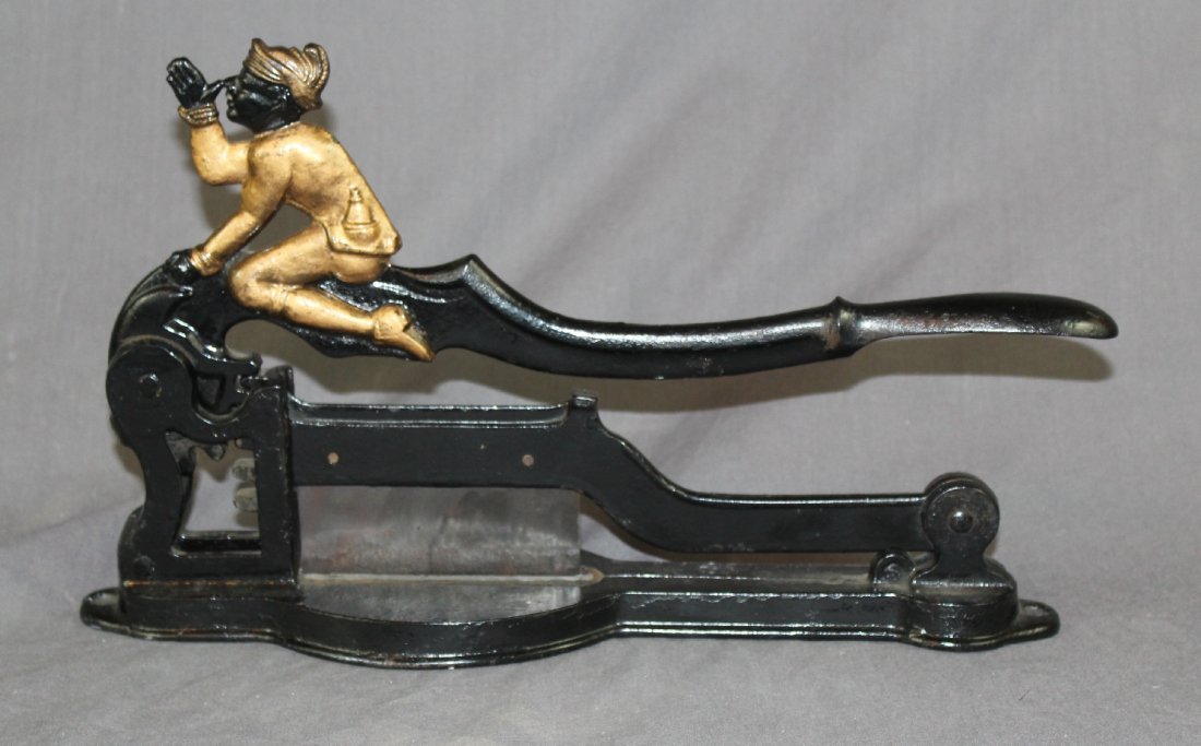 Cast iron tobacco cutter: Cast iron tobacco cutter. 8.5"h x 14"w