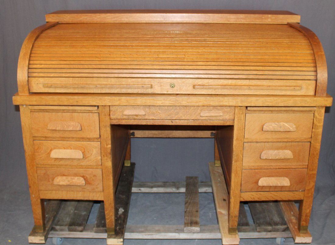 Roll top desk in oak: Roll top desk in oak. 43 1/2"h x 60"w x 36"d