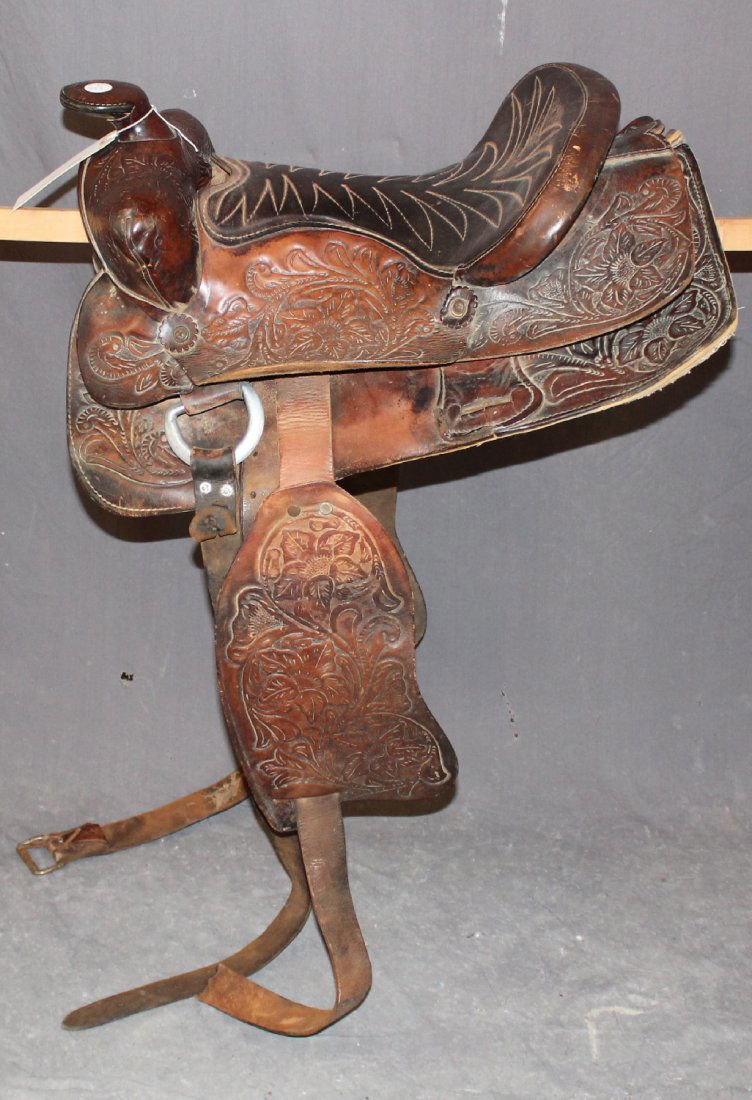 Western embossed leather saddle (1 of 2)
