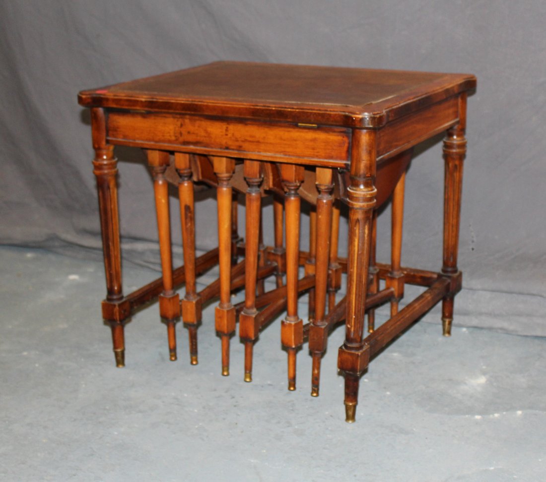 Nest of 3 dropside tray tables in side table: Leather top mahogany side table with nest of 3 drop side tea tables. 19 1/2"h x 21"w x 17 3/4"d