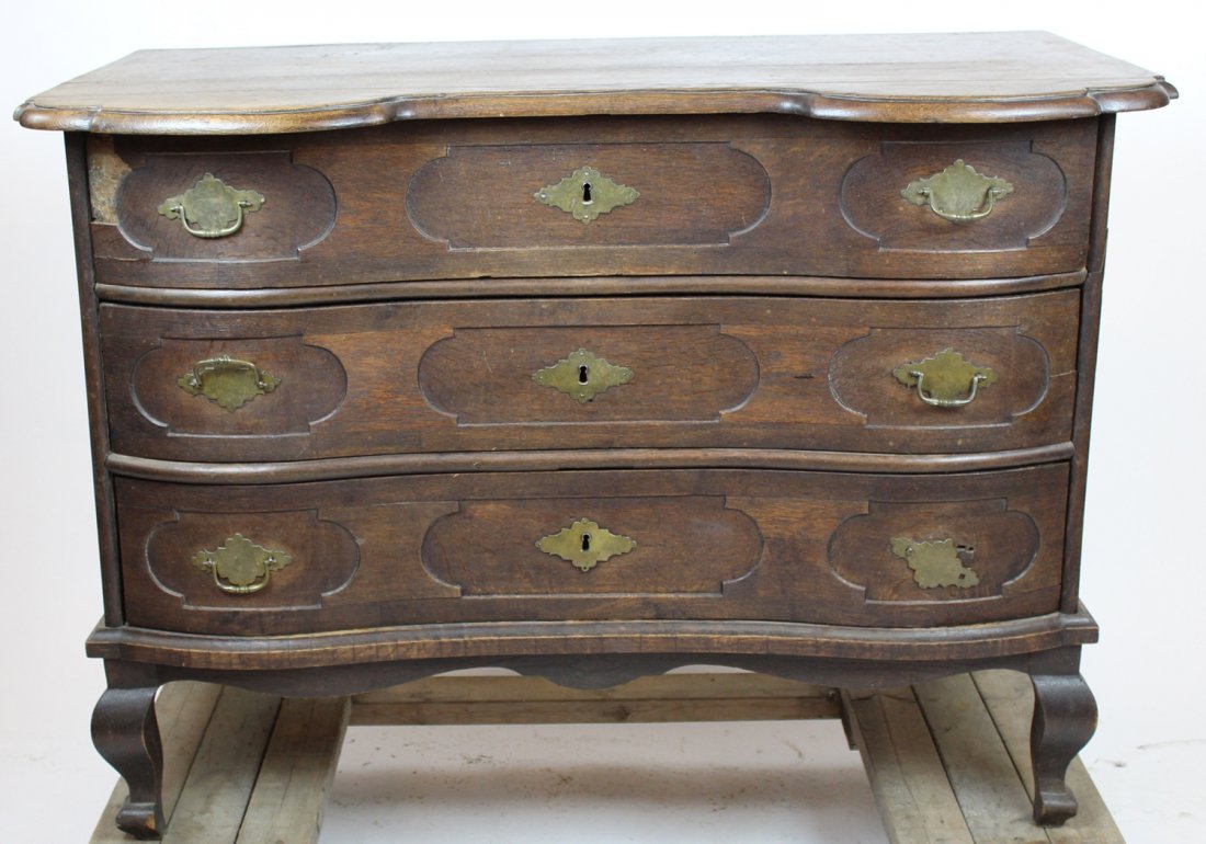 German 3 drawer commode in oak: German 3-drawer commode in oak. 35"h x 48 1/4"w x 25 1/2"d