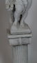 Cast cherub statue on pedestal - 2