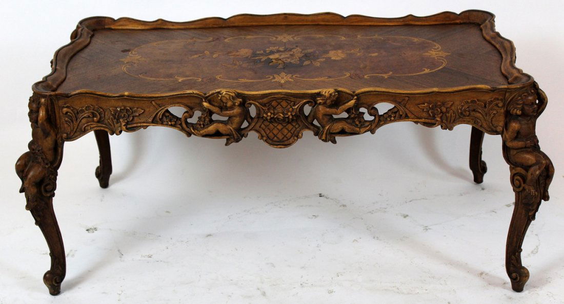 Italian cocktail table with carved full figured cherubs (1 of 4)