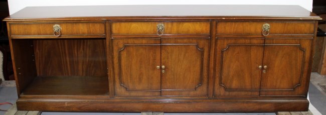 Kittinger credenza with lion head pulls: Kittinger credenza with lion head pulls and built-in fridge. 31"h x 91 1/2"l x 18"d