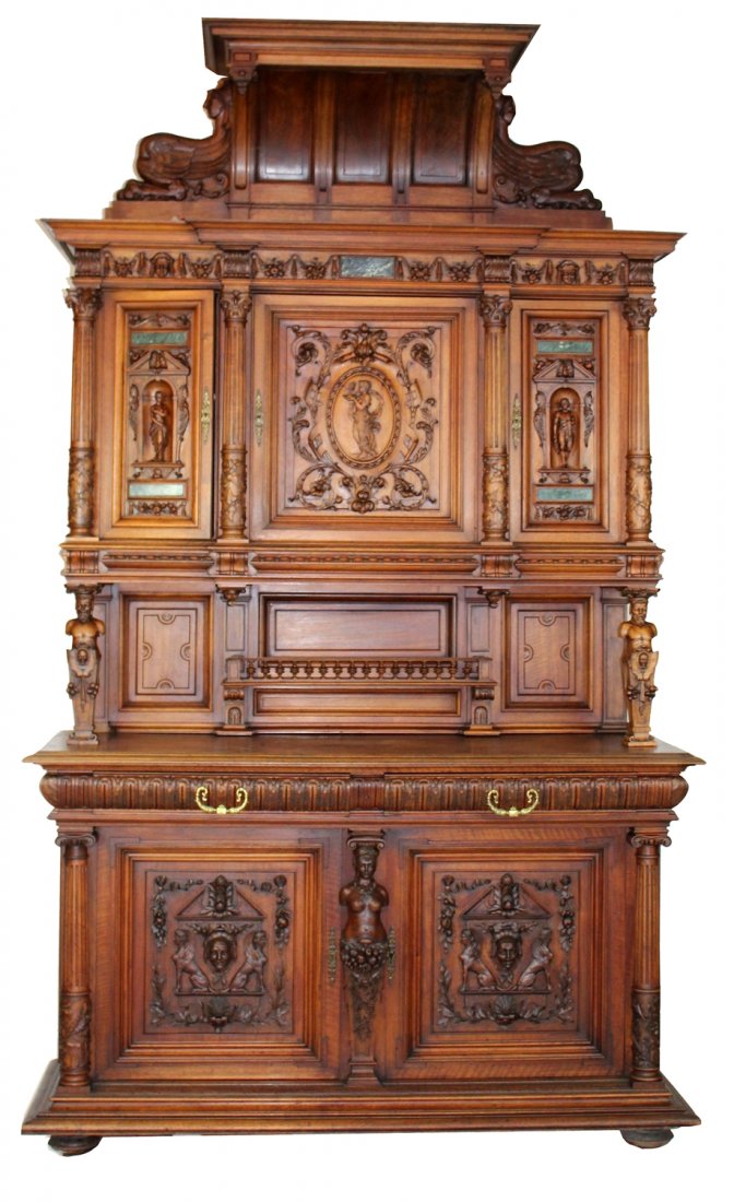 Grand scale French Renaissance buffet: Grand scale French Renaissance buffet with classical figural carvings, marble plaques and winged griffins. Late 19th century. 113"h x 67"w x 24"d