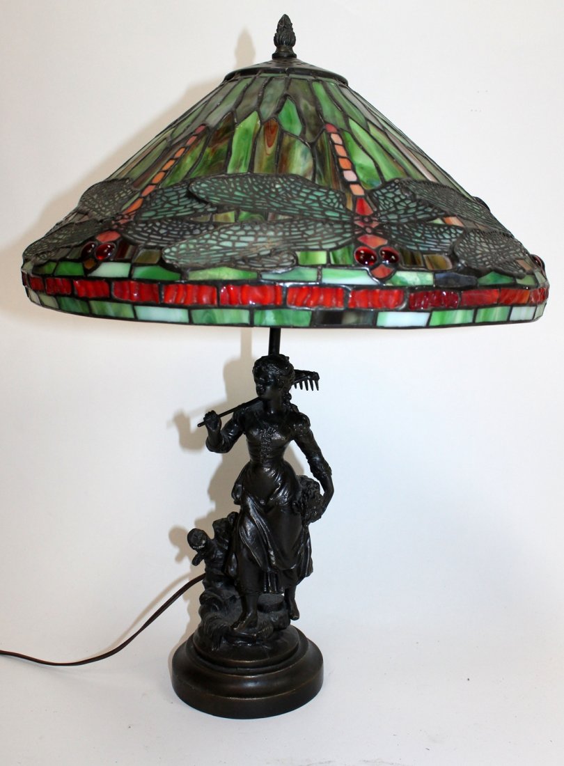 Figural lamp with stained glass dragonfly shade (1 of 3)