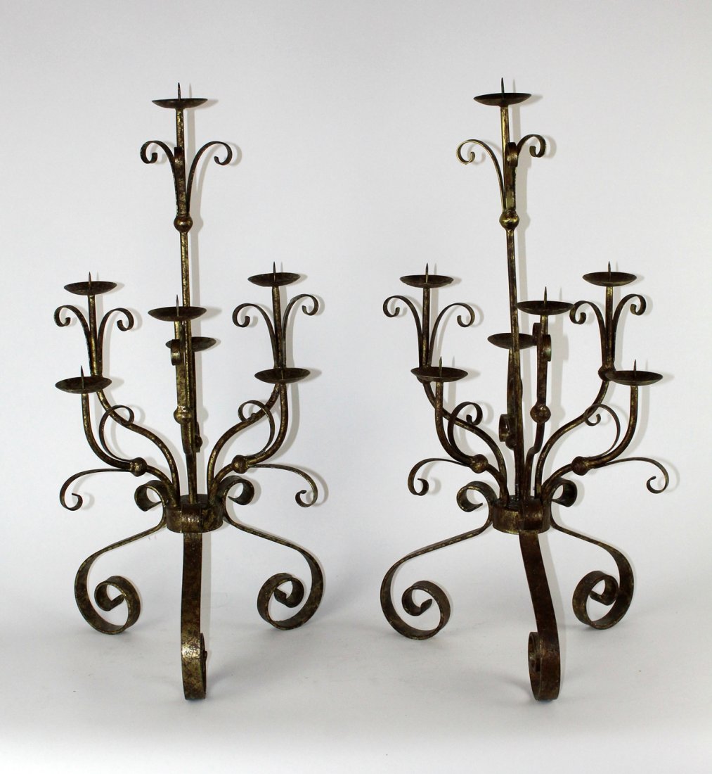 Pair of gold painted 6 arm iron candelabra: Pair of gold painted 6 arm iron candelabra. 31"h x 16"w