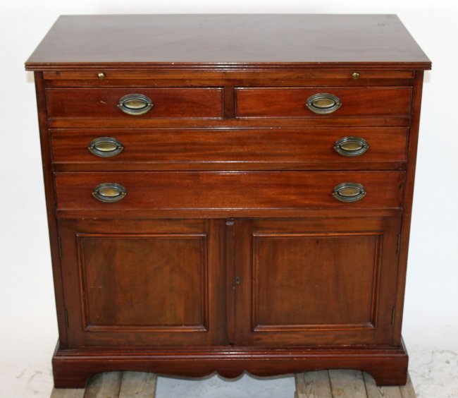 Lionel Rawlinson Limited mahogany cocktail cabinet: Lional Rawlinson Limited mahogany cocktail cabinet. 34.25"h x 36"w x 19"d