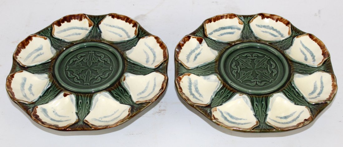 Lot of 2 French Longchamp footed oyster plates: Lot of 2 French Longchamp terre de fer footed oyster plates. 2 1/2"h x 9 5/8" dia