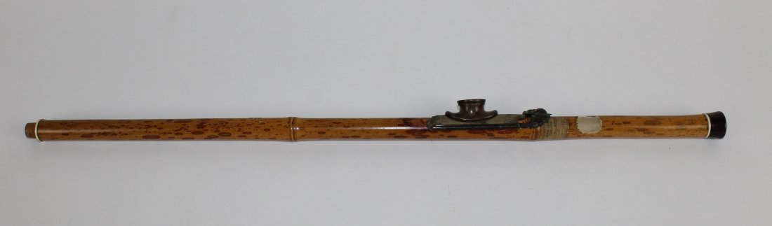 Chinese bamboo opium pipe with brass saddle (1 of 6)