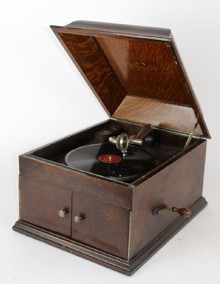 Vintage Victrola phonograph in oak case.