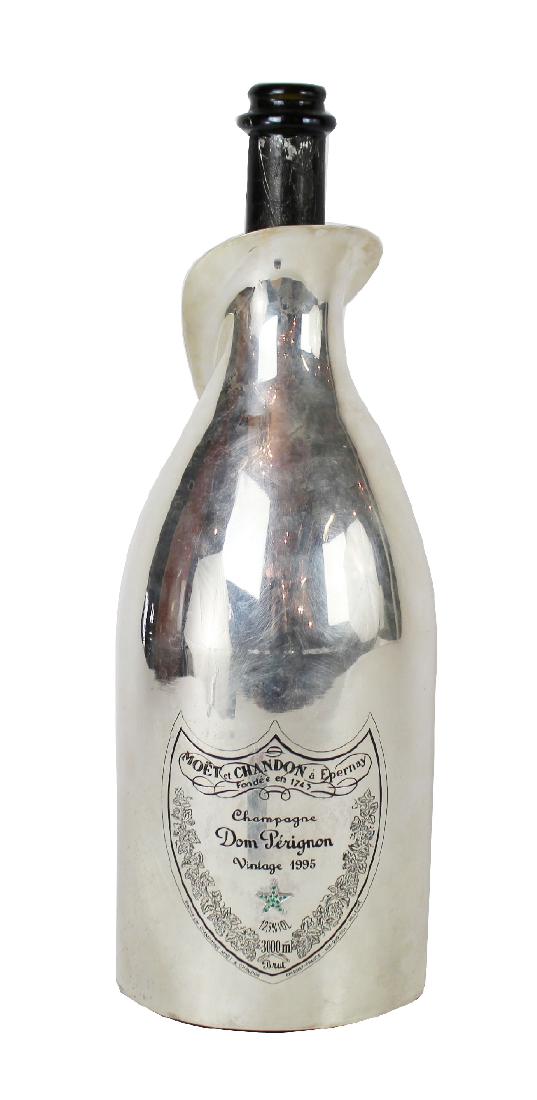 Rare 1995 Dom Perignon for Byblos bottle: Rare limited edition 1995 Dom Perignon Jerobaum bottle made for the Byblos Hotel in Saint Tropez. 1 of 10 made. This one is marked no. 8. Bottle feature a White Gold plated "robe" with emeralds. 17 1/