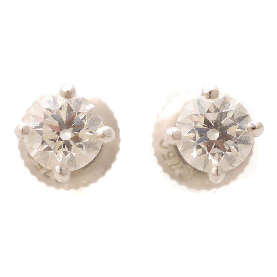 Pair of Diamond, 18k White Gold Stud Earrings. (1 of 4)