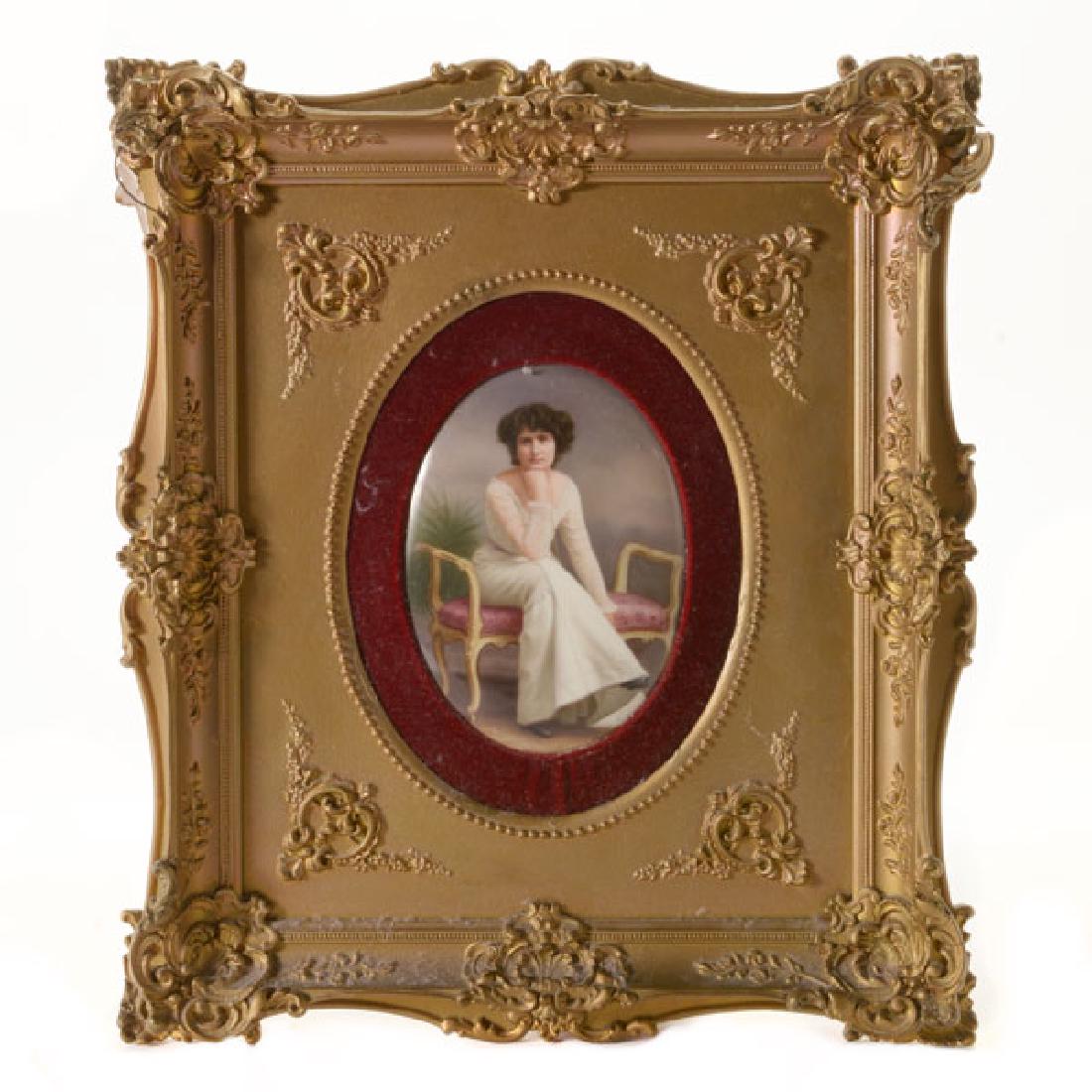 KPM Porcelain Plaque of Lady: KPM Porcelain Plaque of Lady The oval form depicting a young brunette haired lady, seated in a bench, her head resting on her elbow, the plaque mounted on red velvet board inset in a gilt gessoed fram