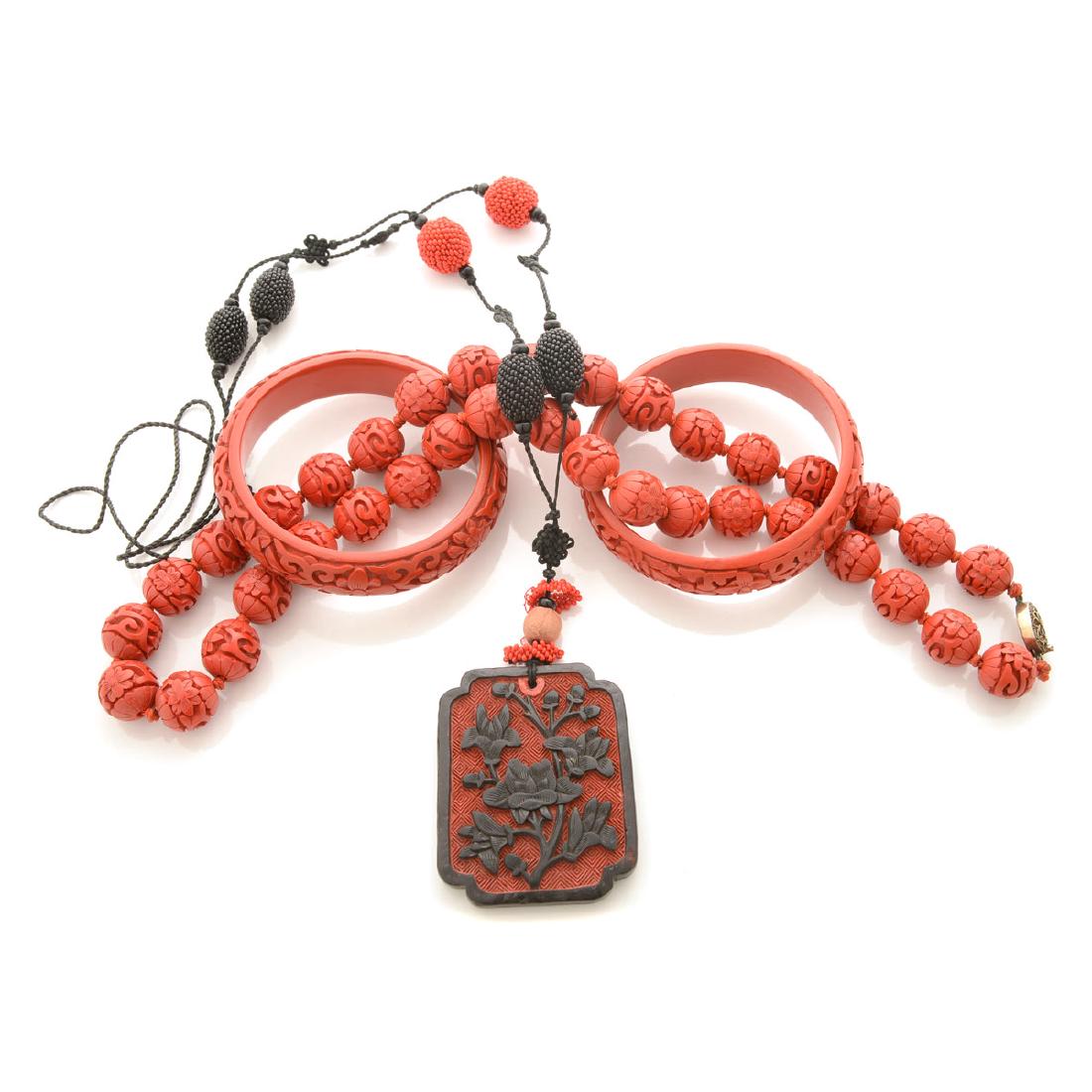 Collection of Chinese Cinnabar Jewelry. (1 of 5)