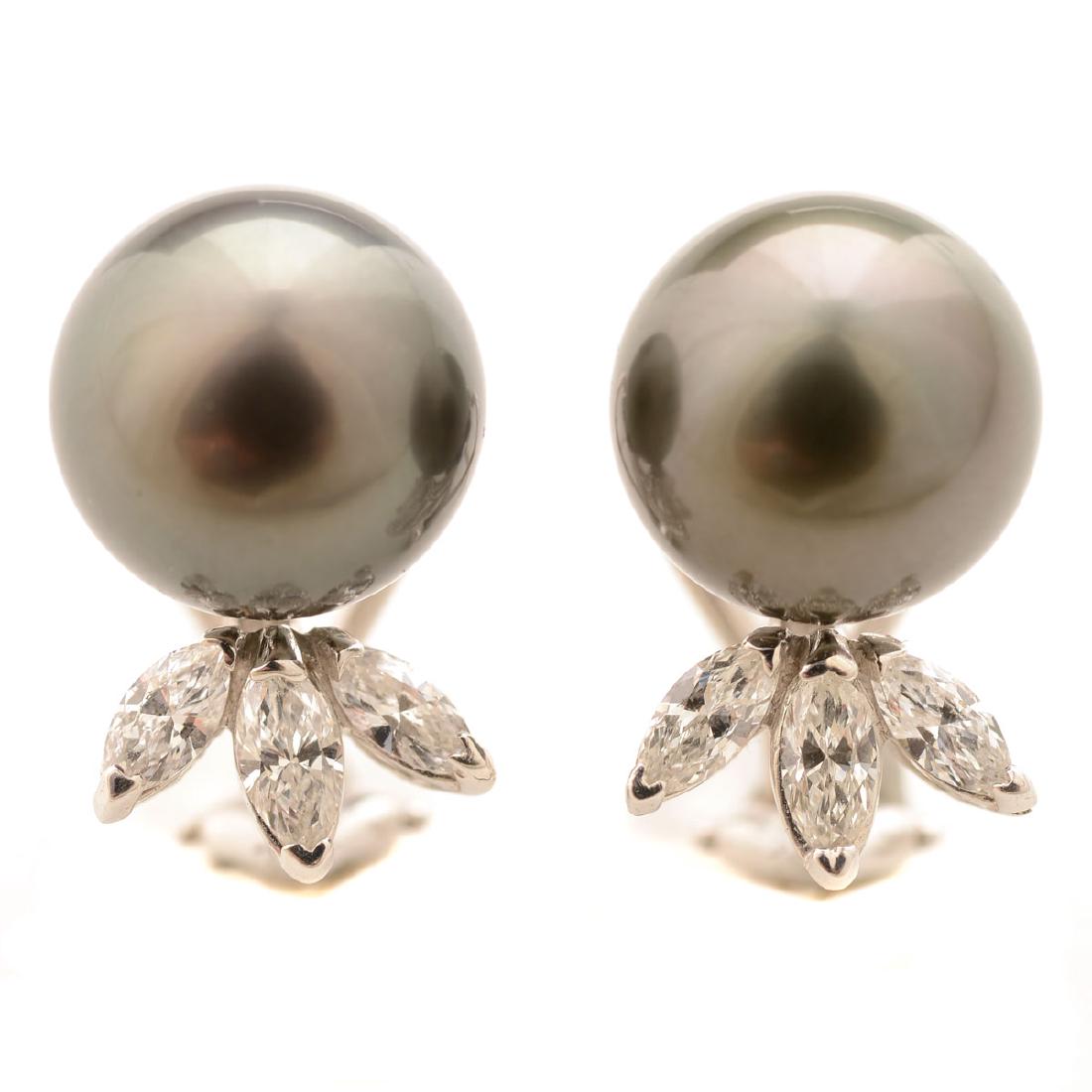Pair of Tahitian Cultured Pearl, Diamond, 18k White: Pair of Tahitian Cultured Pearl, Diamond, 18k White Gold Earrings. Each featuring one round black Tahitian cultured pearl measuring approximately 11.1 mm, accented by three marquise-cut diamonds weigh
