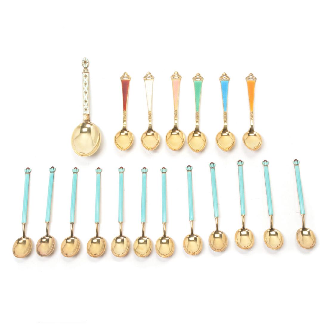 Scandinavian 830 Standard Spoons and Serving Articles: Collection of Norwegian and Swedish 830 Standard Spoons and Serving Articles Cased pair of Guldsmeds serving articles {length 11 1/8 inches}; Cased set of twelve Slektsolv gilt enamel demitasse spoons
