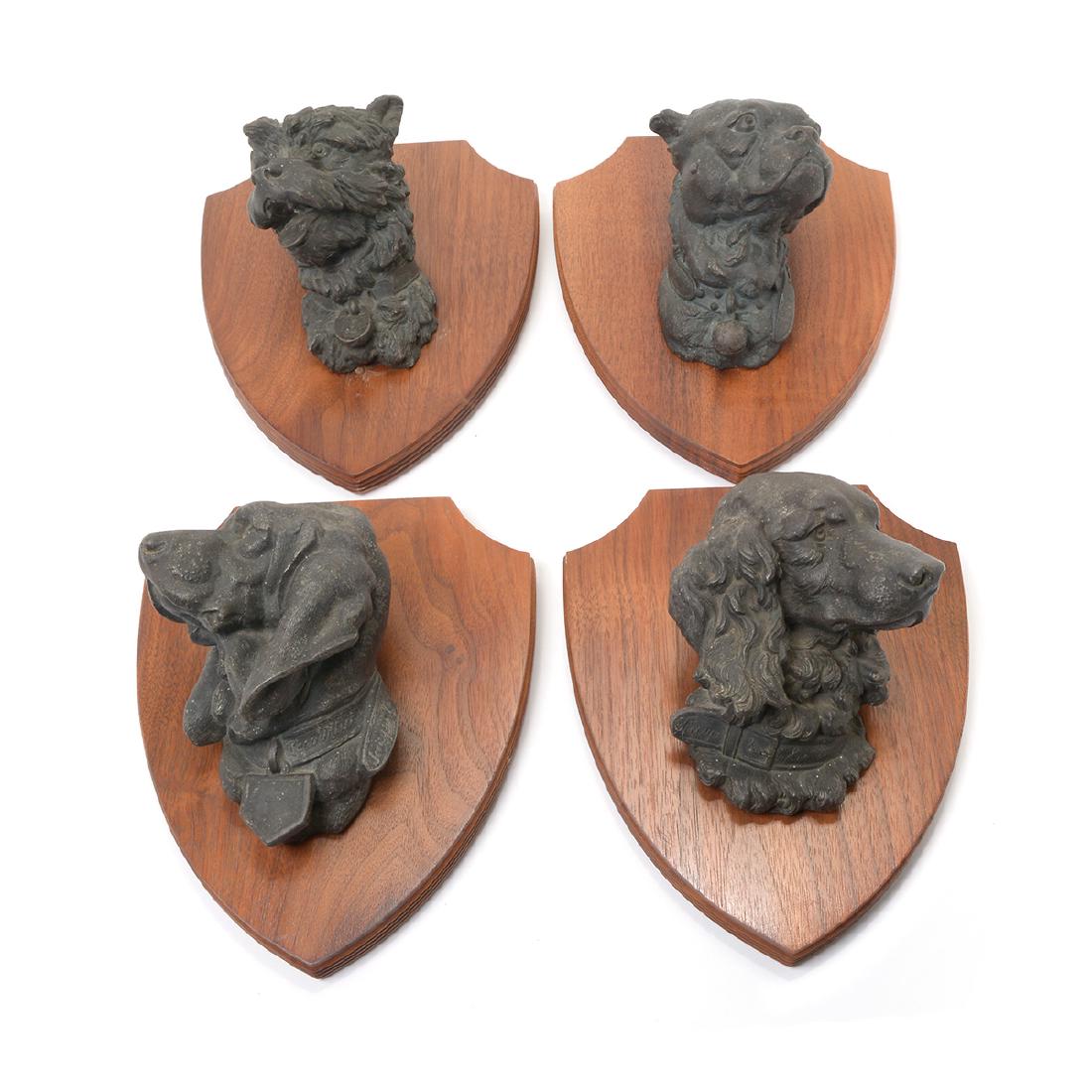 Set of Four Dog Busts Mounted on Shield Form Plaques (1 of 9)