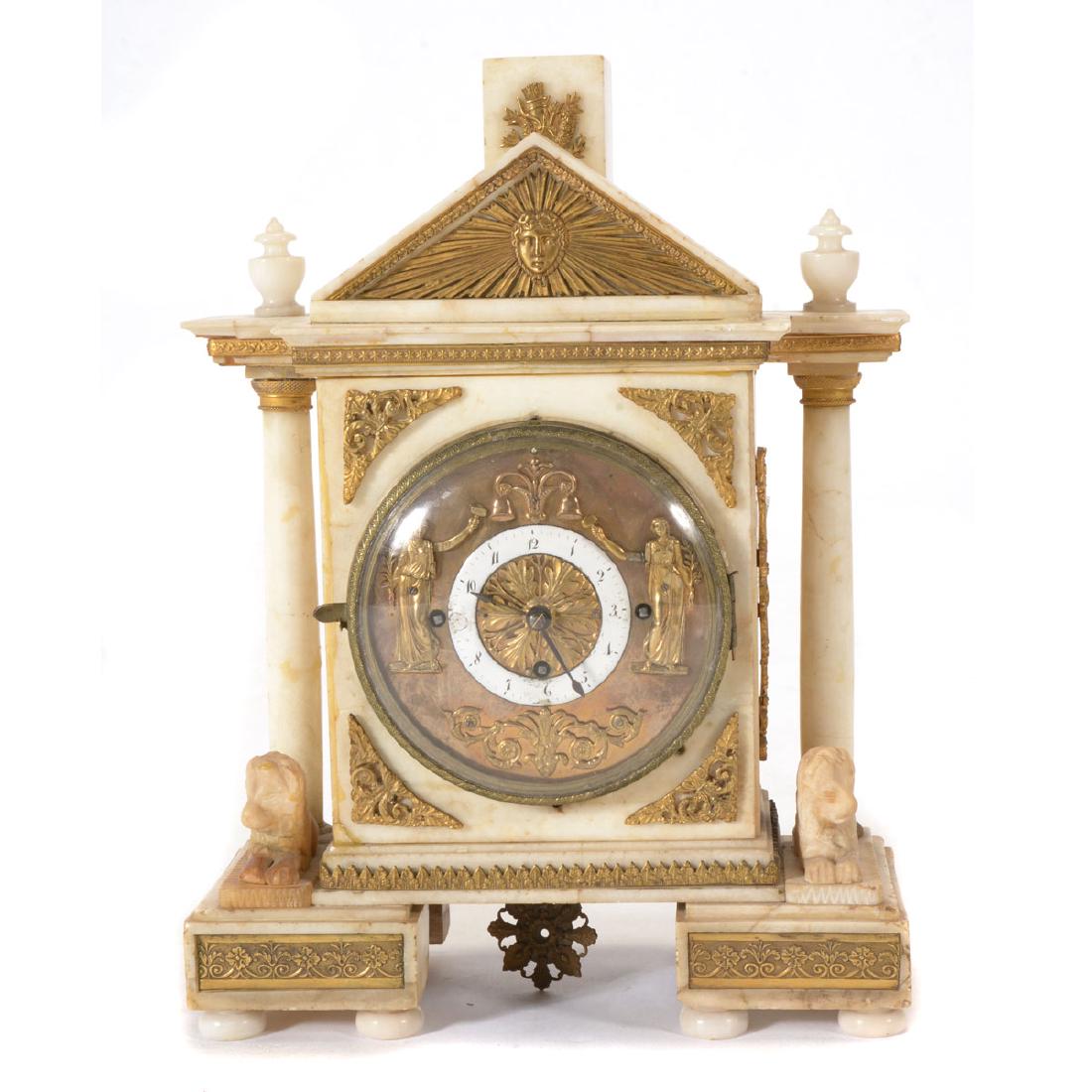 Alabaster Brass Fitted Portico Clock: Alabaster Brass Fitted Portico Clock {Dimensions 13 1/4 x 10 1/2 x 4 1/2 inches} [repairs to base and columns, missing finial, damage to porcelain dial; two keys, pendulum]