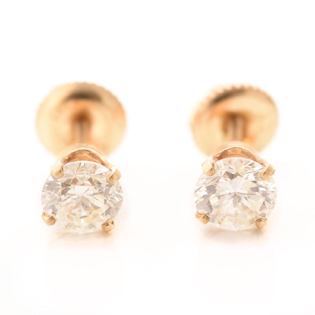 Pair of Diamond, 14k Yellow Gold Stud Earrings. (1 of 3)
