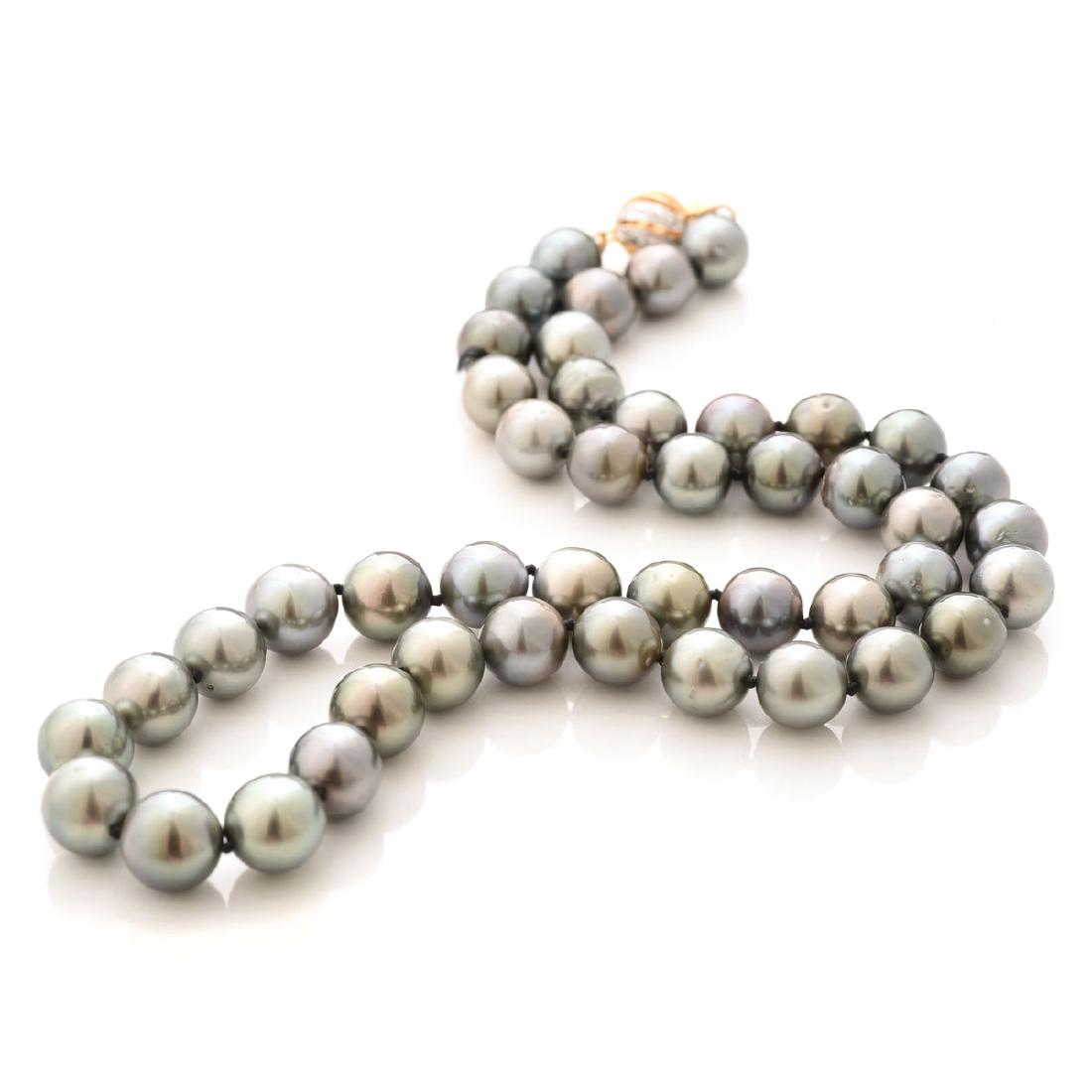 Tahitian Cultured Pearl, Diamond, 14k Gold Necklace.: Tahitian Cultured Pearl, Diamond, 14k Gold Necklace. Composed of forty-five Tahitian cultured pearls ranging in size from approximately 9.5 mm to 8.5 mm, completed by a diamond accented, 14k yellow an