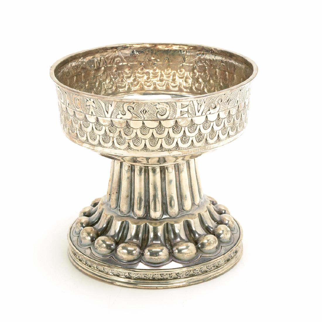 George V Sterling Reproduction of Elizabethan Holmes: George V Sterling Reproduction of Elizabethan or Tudor Holmes Cup of 1521. The wide chalice form chased with a repousse organic scale on a fluted pedestal foot, a Latin inscription "Benedictus deus in