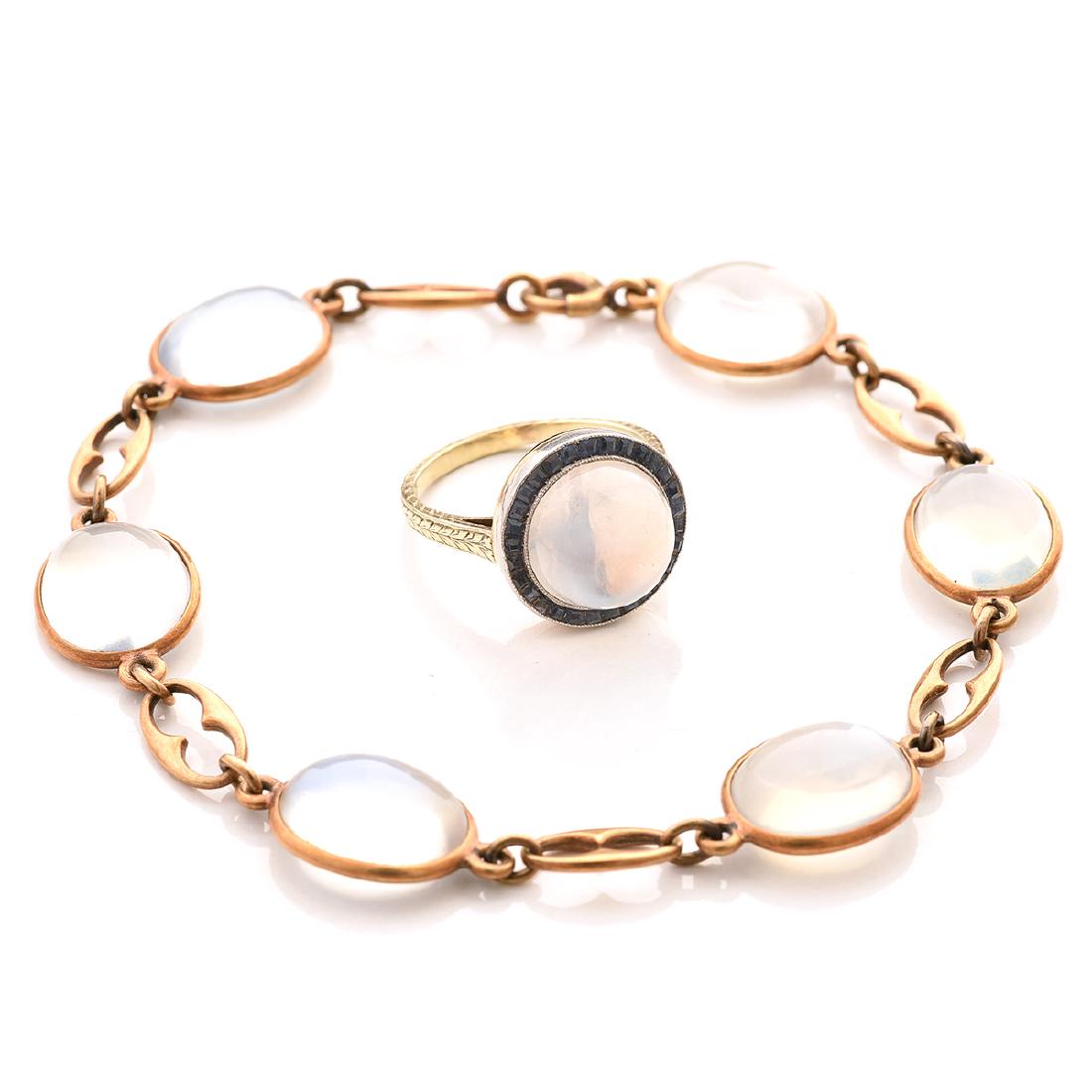 Moonstone, Sapphire, 14k Yellow Gold Jewelry Suite.: Moonstone, Sapphire, 14k Yellow Gold Jewelry Suite. Including six oval-cut moonstone cabochons ranging in size from approximately 12.2 x 9.5 mm to 11.2 x 9.2, set in 14k yellow gold bezels, separated