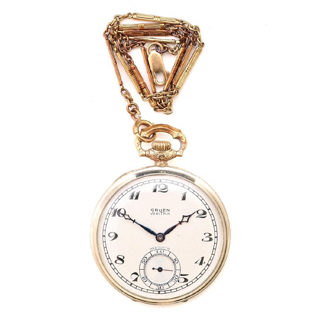 Gruen 14k Gold Pocket Watch with Chain.: Gruen 14k Gold Pocket Watch with Chain. DIAL: Round, white, black Arabic numeral hour markers, black outer minutes track, sunken subsidiary dial at 6 o'clock, blued kite hands, Gruen. MOVEMENT: Manual