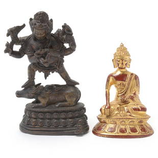 Two Bronze Buddhist Figures, 17th/18th Century: Two Bronze Buddhist Figures The first is a Tibetan bronze figure of a multi head and arm deity striding a recumbent ox; the second is a gilt and lacquered bronze figure of Buddha. 17th/18th Century {H