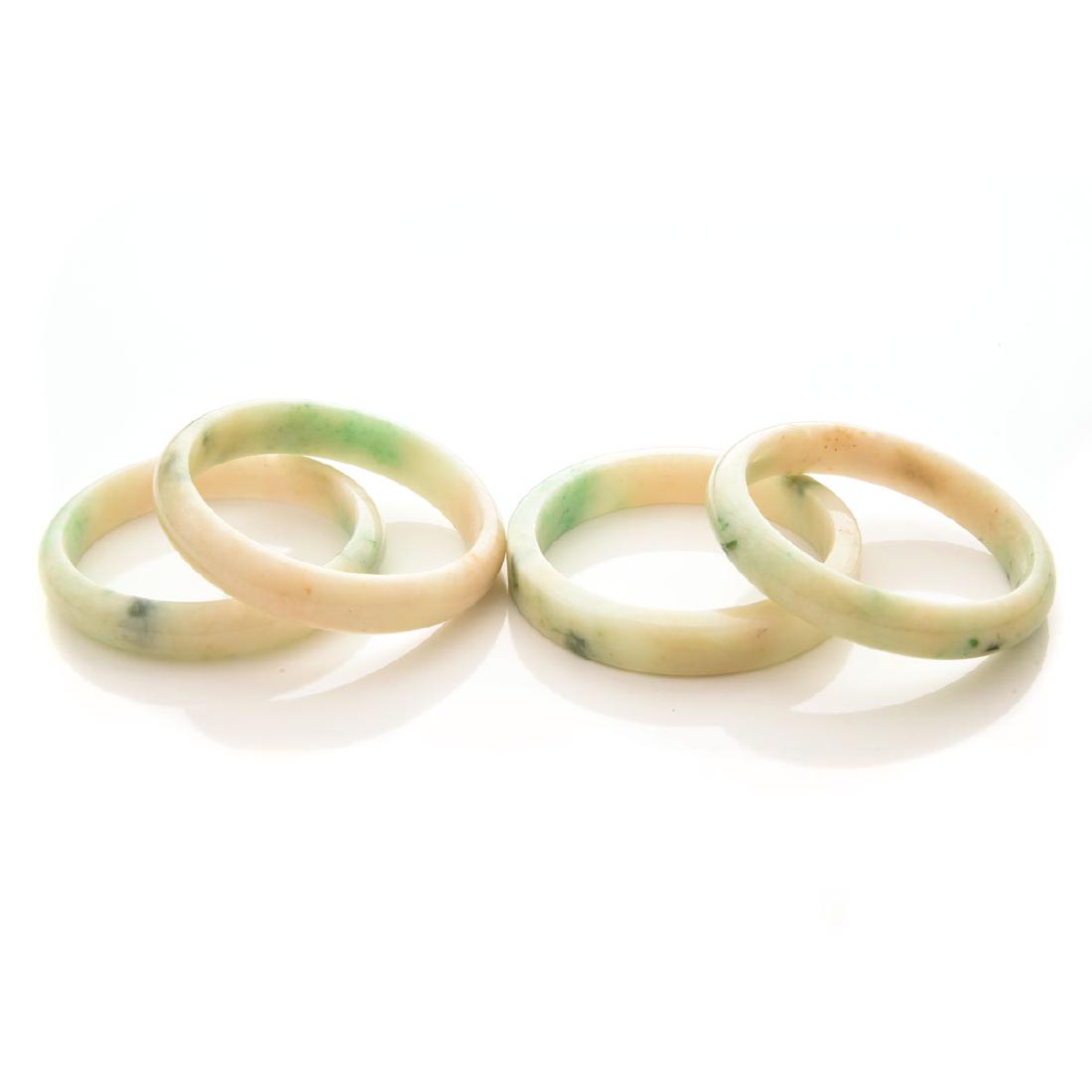 Collection of  Four Jade Bangle Bracelets. (1 of 4)