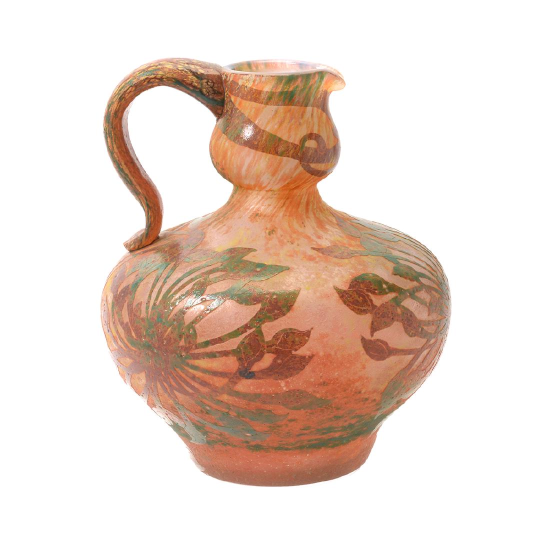 Daum Cameo Glass Pitcher: Daum Cameo Glass Pitcher. Wide body pitcher with bulged neck. Decorated in multicolor flora motif. Marked bottom Daum Nancy with Cross of Lorraine mark. Circa early 20th century. {Approximate dimensio