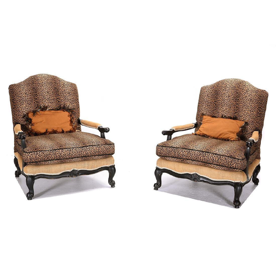 Pair of Louis XV Style Bergeres: Pair of Louis XV Style Bergeres. Black painted wood frames with faux leopard upholstery. {Approximate dimensions: 33 deep x 36 1/2 wide x 43 inches tall.} Condition: Minor losses and scuffs to paint f