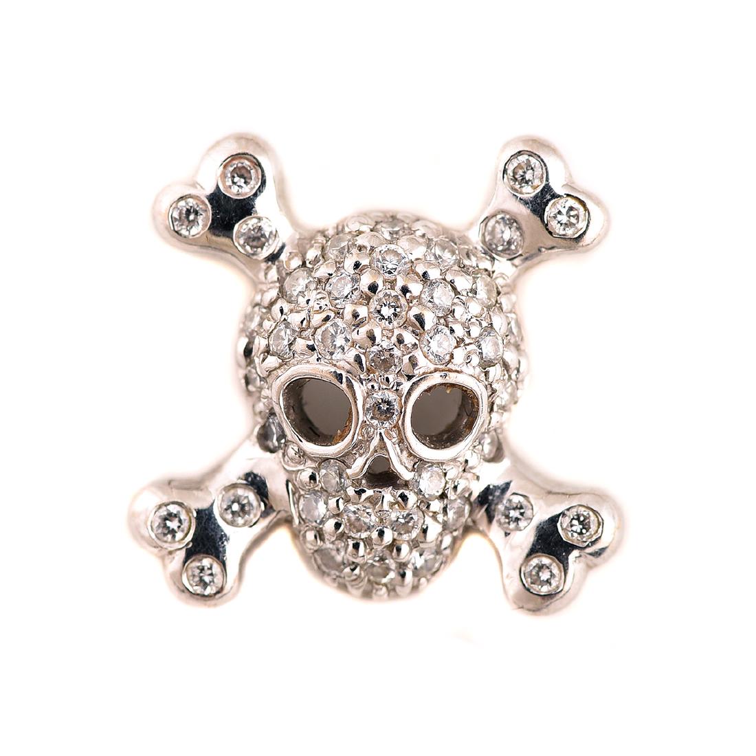 Roberto Coin "Tiny Treasures" Skull and Crossbones: Roberto Coin "Tiny Treasures" Diamond, 18k White Gold Skull and Crossbones Pendant. Designed as a skull and crossbones, featuring full-cut diamonds weighing a total of approximately 0.25 cttw., set in