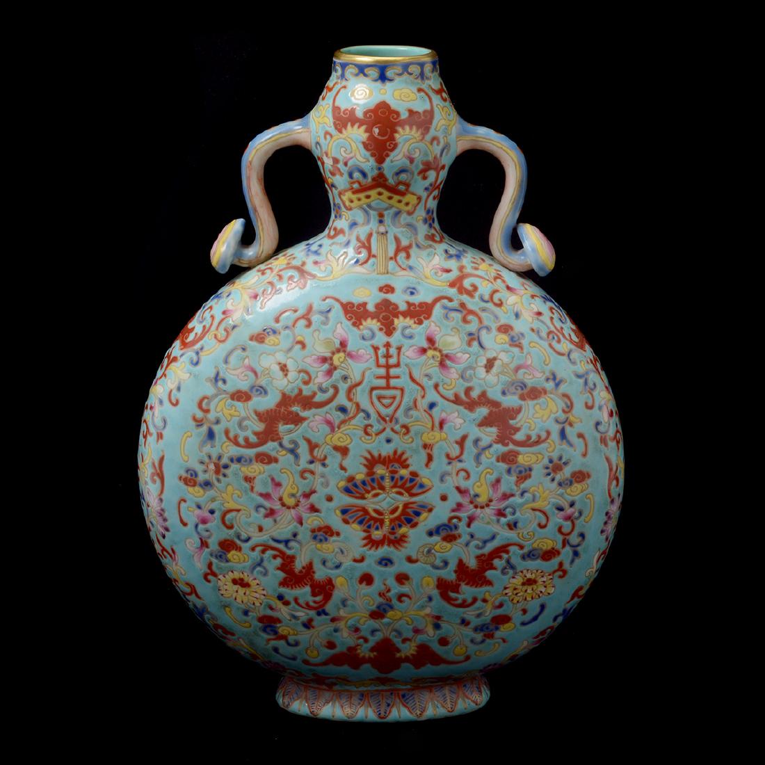 Chinese Famille Rose Turquoise Ground Moon Flask: Chinese Famille Rose Enameled Turquoise Ground Porcelain Moon Flask. The moon flask is decorated with two butterflies in the center, surrounded by six bats and interlinked lotus scrolls on both sides,
