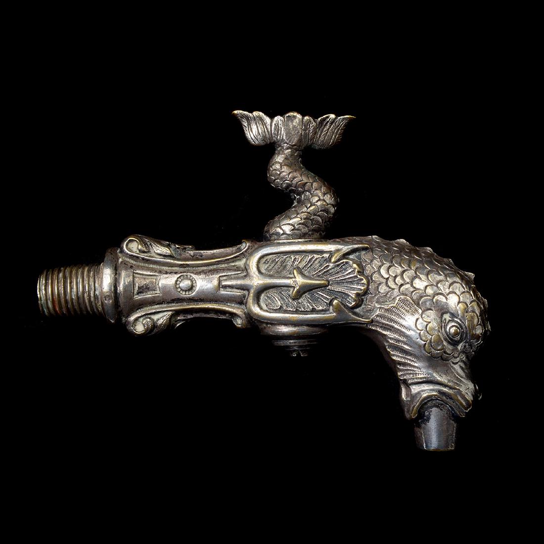 Continental Baroque Style Silvered Bronze Dolphin: Continental Baroque Style Silvered Bronze Dolphin Spigot with Spiraling Tail Handle. 19th century. {Approximate dimensions: 5 inches long.} Property from a San Francisco Collection.
