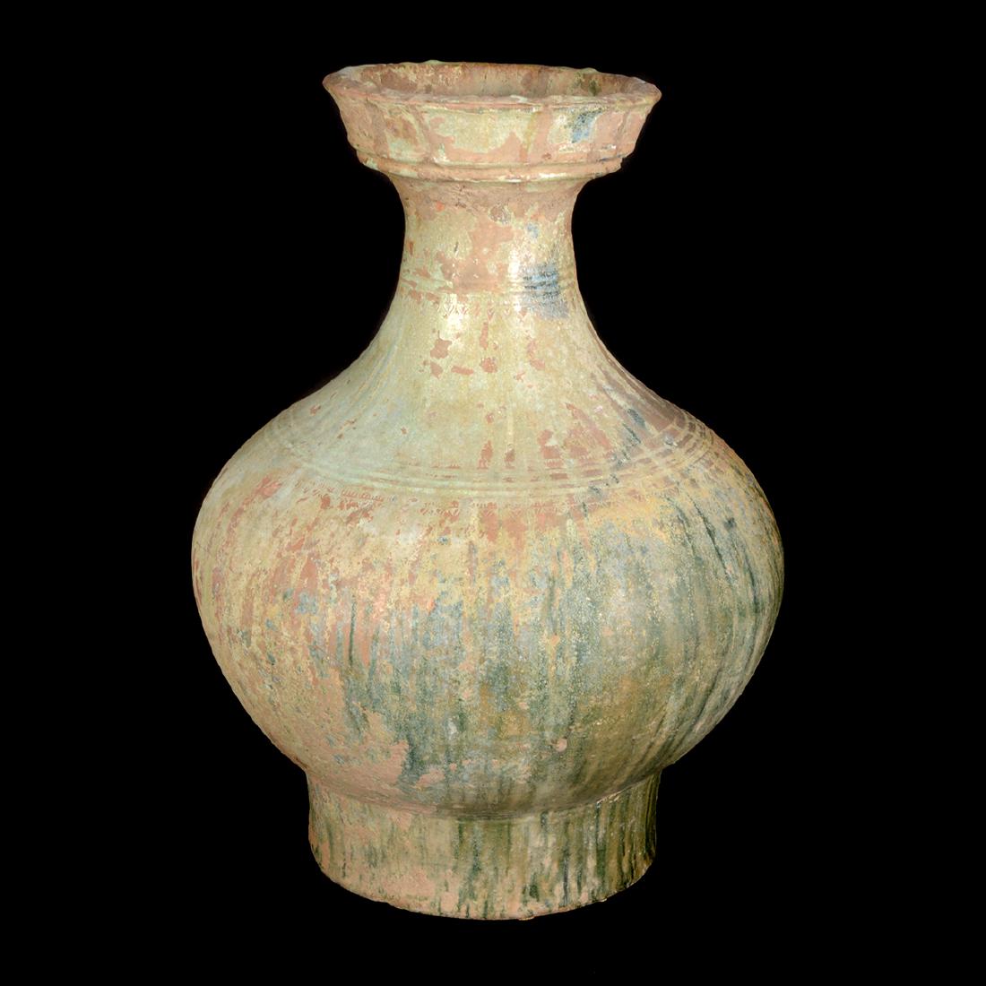 Large Chinese Han Dynasty Pottery Hu-Form Vase: Large Chinese Han Dynasty Pottery Hu-Form Vase. {Height: 17 3/4 inches (45 cm)}.