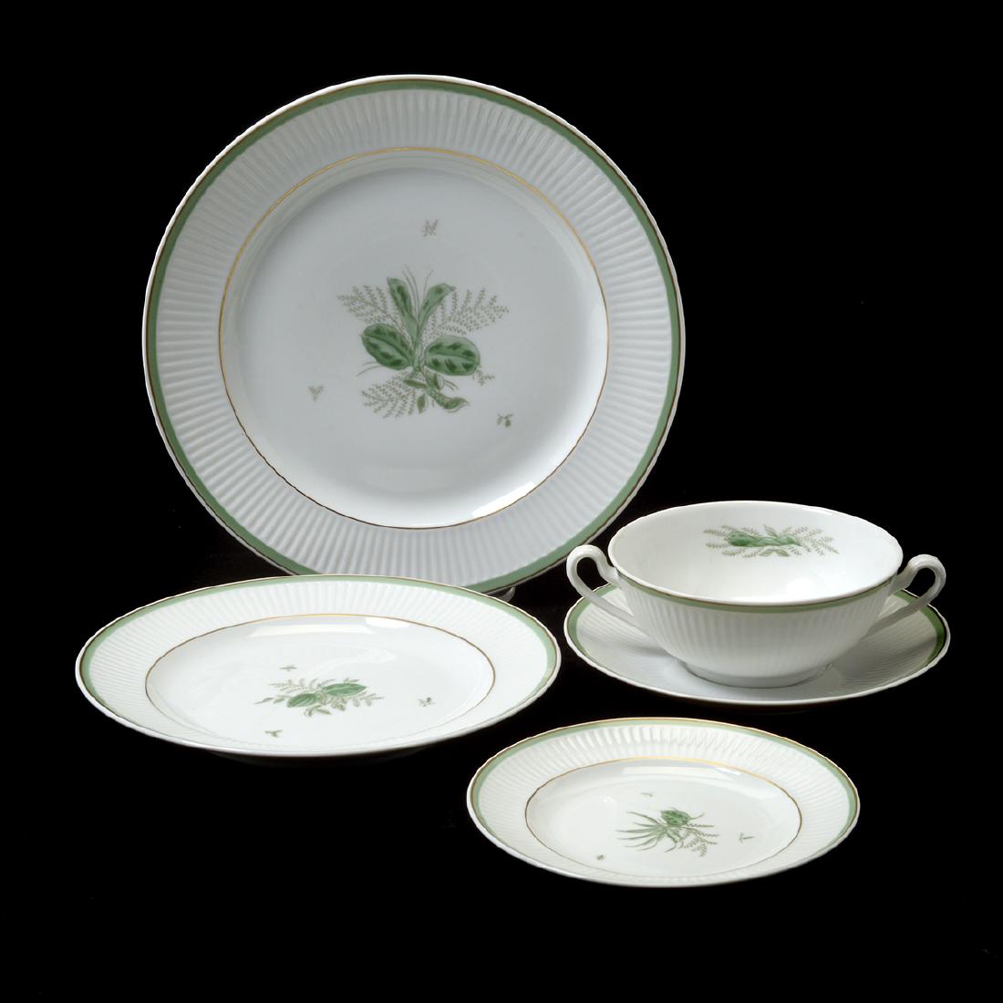 Danish Royal Copenhagen Melodi Pattern Porcelain Dinner: Danish Royal Copenhagen Green Melodi Pattern Porcelain Dinner Service. 69 piece lot comprising fourteen dinner plates, fourteen salad plates, thirteen bread and butter plates, and fourteen cream soup 