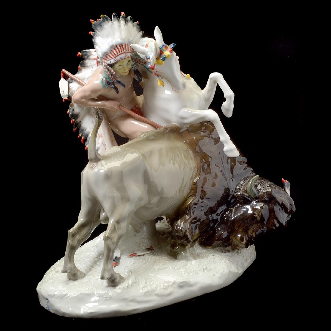 Meissen Porcelain Figural Group Native American Slaying: Meissen Porcelain Figural Group Native American Slaying Buffalo. Depicts a Native American hunter with a headdress mounted on a horse driving a spear into a buffalos side. Crossed swords mark with dot