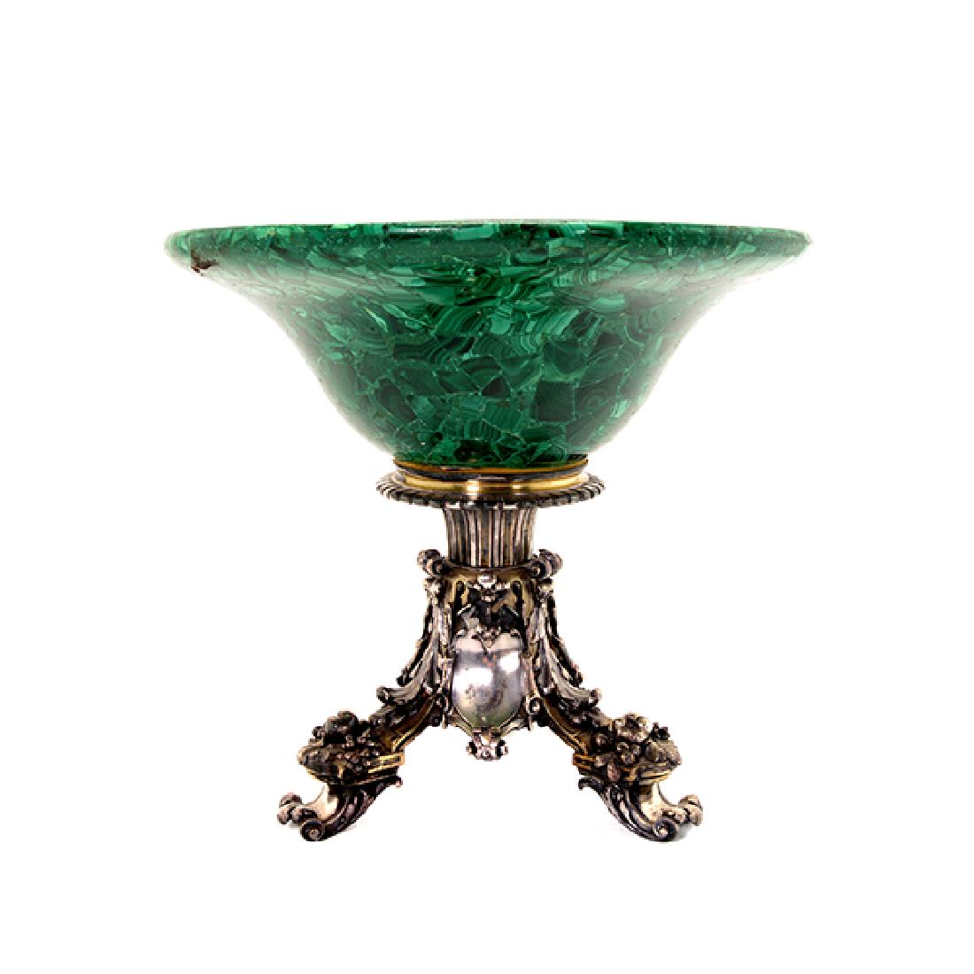 Christofle Malachite Center Bowl on Silver Pedestal: Maison Christofle Malachite Center Bowl on A Silver Pedestal. The finely hewn round bowl rim raised atop a petal rim tripod base cast with sprays of fruit, ending in scroll feet, stamped with Christof