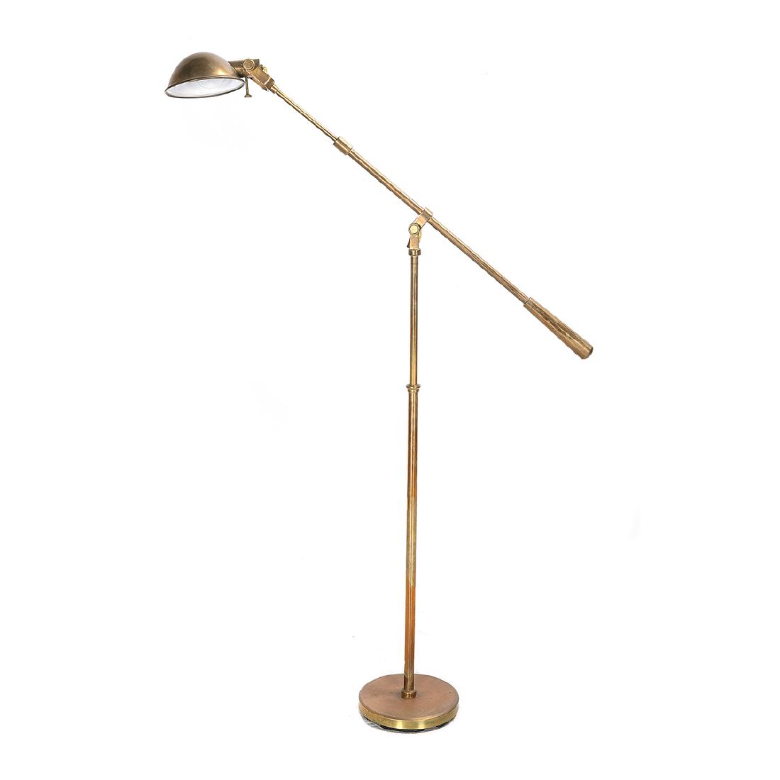 Ralph Lauren Brass Articulated Spotlight Floor Lamp: Ralph Lauren Brass Articulated Spotlight Floor Lamp. With a dome shade and a round base. Ralph Lauren badge on the side of the base. {Approximate dimensions: 70 high at fullest extension x 10 inches d