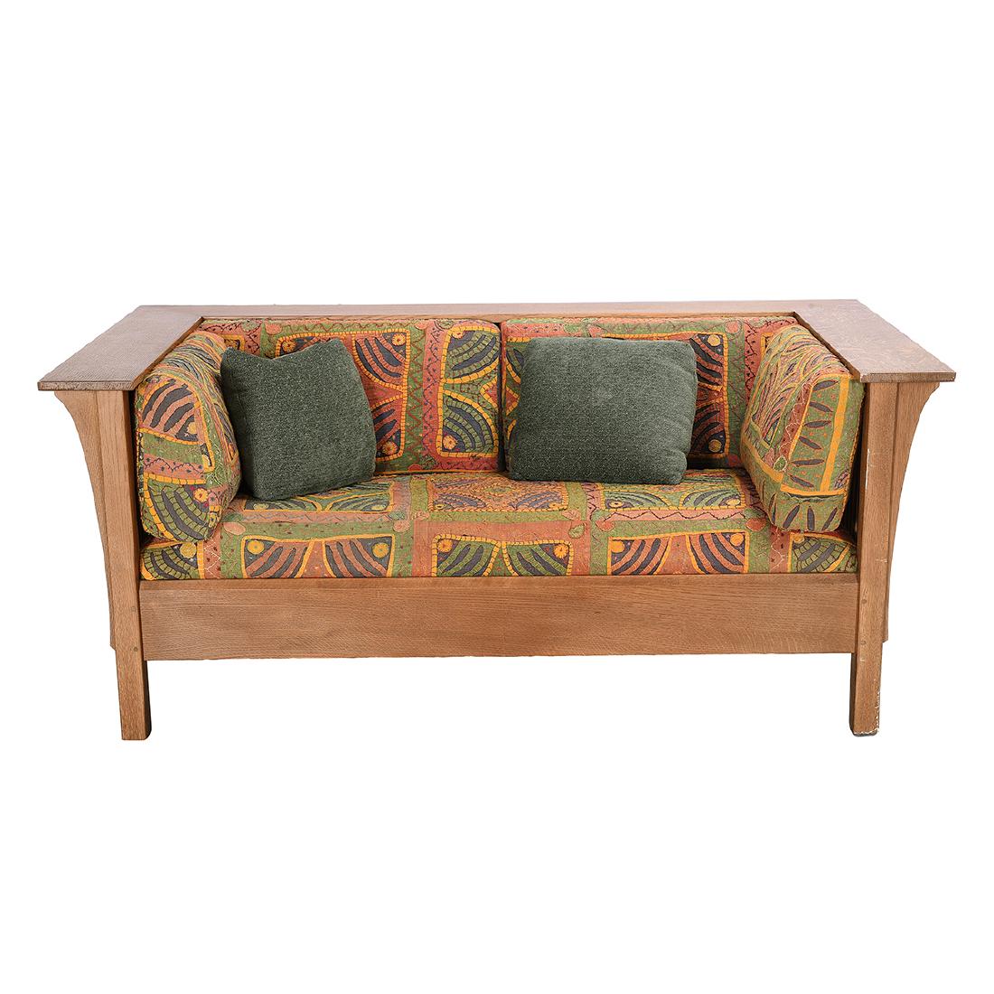 Stickley Arts and Crafts Style Oak Sofa with East: Stickley Arts and Crafts Style Oak Sofa with East Indian Upholstered Cushions. With plank form arms and a matching back, with slatted sides and back. Hand-stitched upholstery in a paneled medallion pa