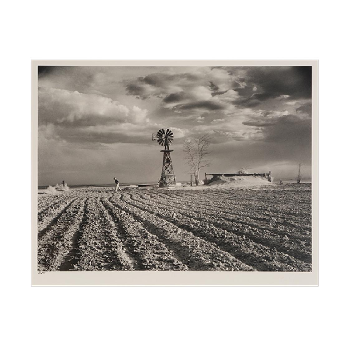 Mararet Bourke-White "Farm with Windmill" photograph: MARGARET BOURKE-WHITE (American 1904-1971) "Farm with Windmill" Photograph. Sight: 14 x 17 3/8 inches; Frame: 23 1/4 x 26 1/2 inches. Embossed signature l/r and numbered l/l: 63/250. Monroe Gallery of