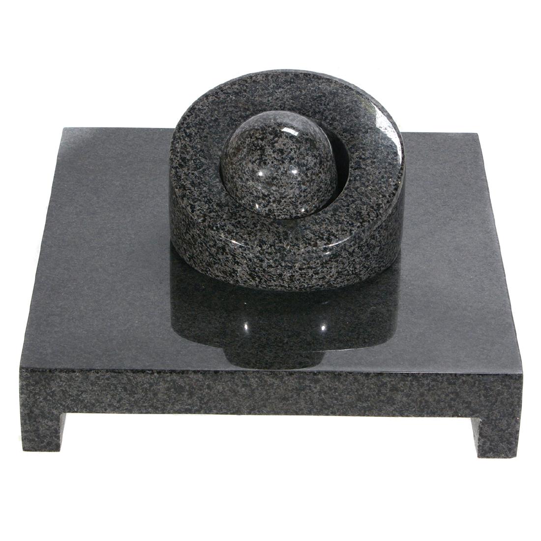 Jesus Moroles "Untitled" black granite assemblage: JESUS BAUTISTA MOROLES (American 1950-2015) "Untitled" Black granite assemblage. 7 x 15 x 14 3/4 inches. Signed and numbered on the right arm on the base. CONDITION: In overall good condition. There a