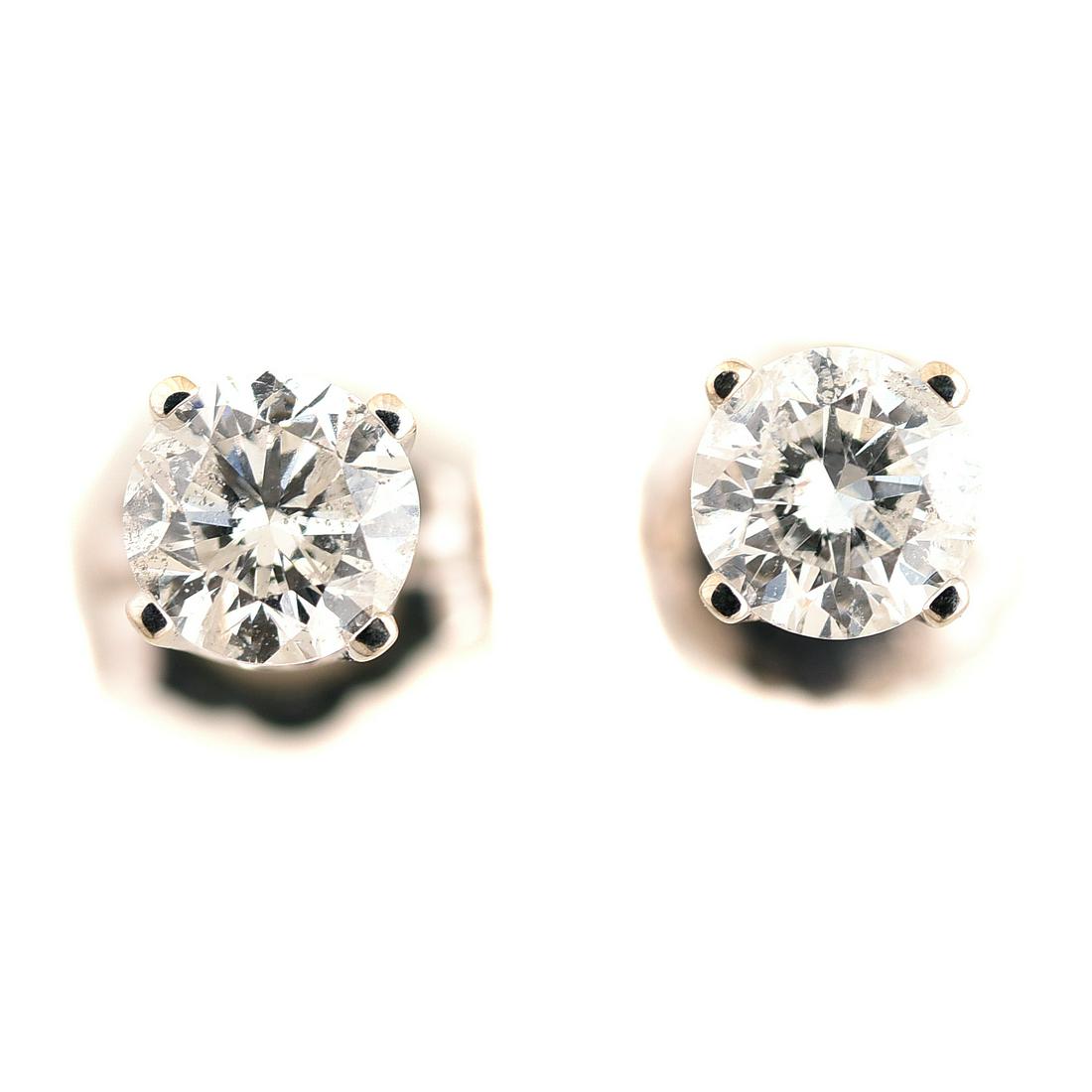 Pair of Diamond, 14k White Gold Stud Earrings. (1 of 3)