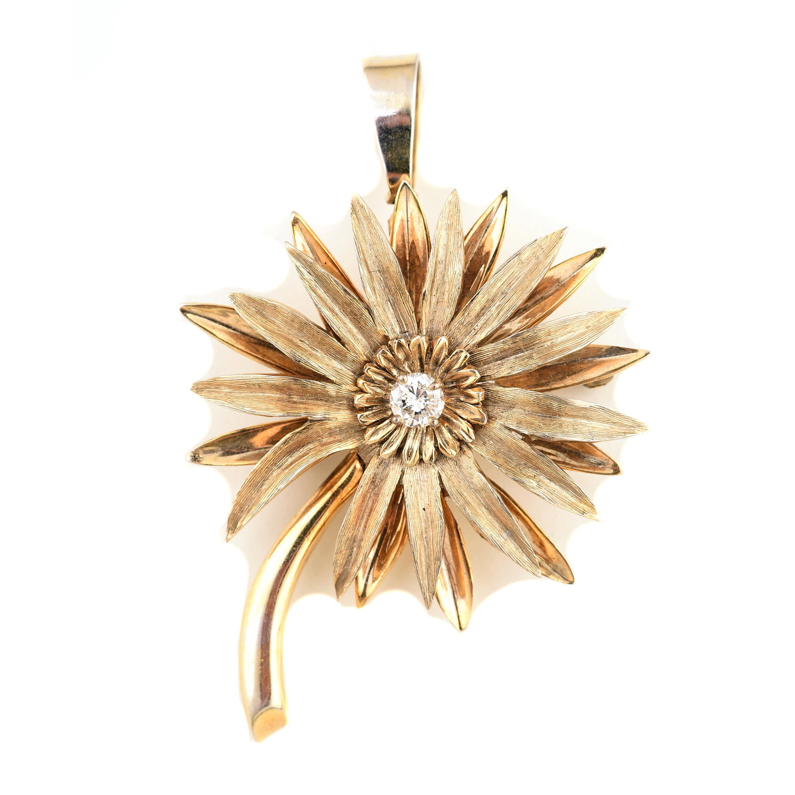 Diamond, 14k Yellow Gold Flower Pendant Brooch.: Diamond, 14k Yellow Gold Flower Pendant Brooch. Designed as a gerbera daisy, the center featuring one full-cut diamond weighing approximately 0.20 ct., set in a 14k yellow gold pendant brooch mounting
