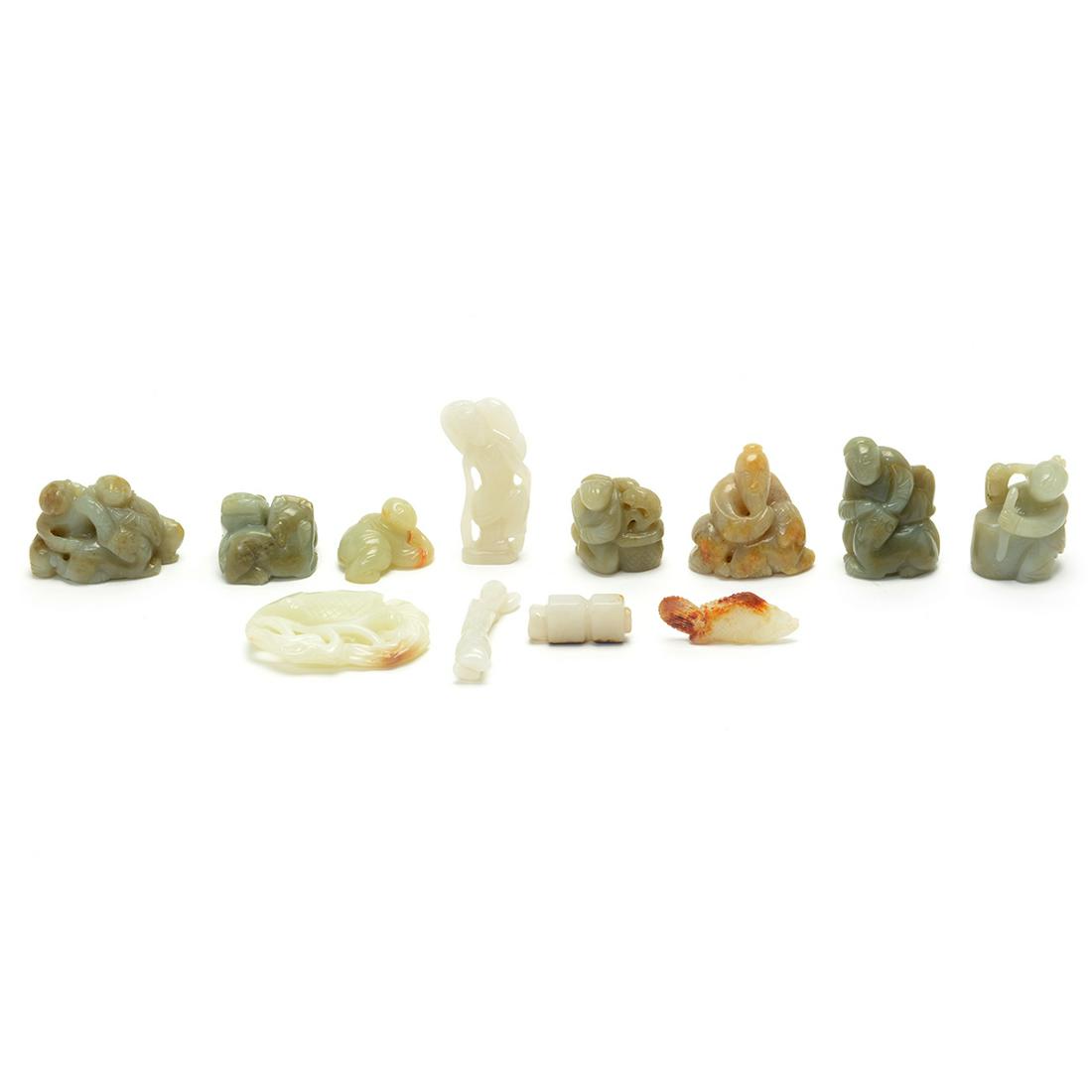 Group of Twelve Chinese Jade and Stone Pendants and: Group of Twelve Chinese Jade and Stone Pendants and Carvings. Comprising eight carved figural white jade and celadon jade carvings and toggles; a russet and celadon jade double badgers toggle; two whi