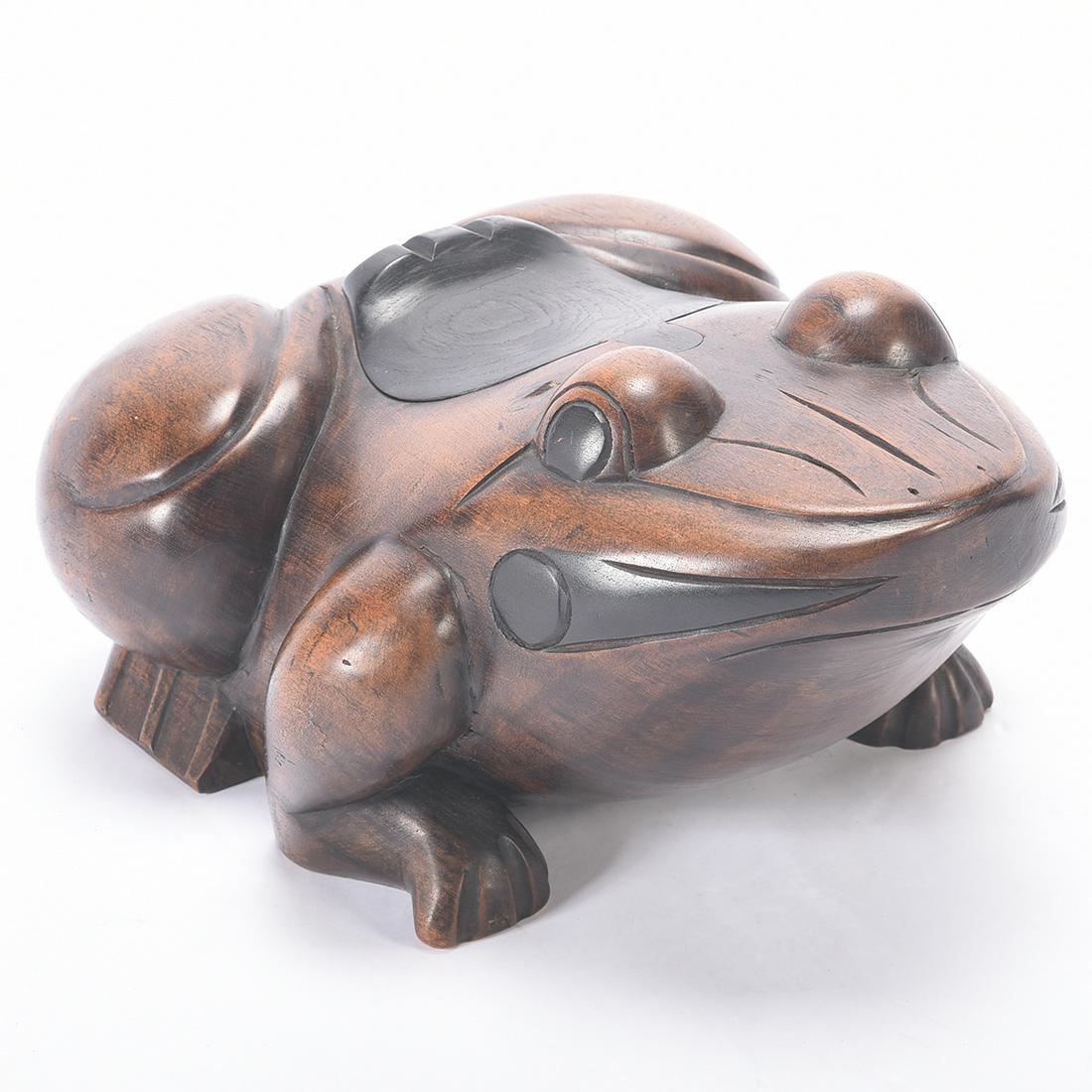 Chinese Carved Wood Frog Form Box: Chinese Carved Wood Frog Form Box. Frog in crouched position with an ebonized hinged lid to the back, and further ebonized trim to the eyes and mouth. {Approximate dimensions, 9 x 17 x 14 inches}.