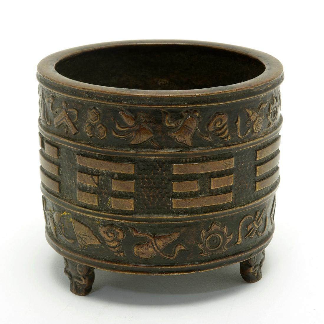 Bronze Tripod Censer with Daoist Symbols.: Chinese Bronze Tripod Censer with Daoist Symbols with "Hu Weng Ming" Inscription. A bronze tripod censer, 19th/20th century In the style of early Ming, of cylinder form supported by three scroll feet,