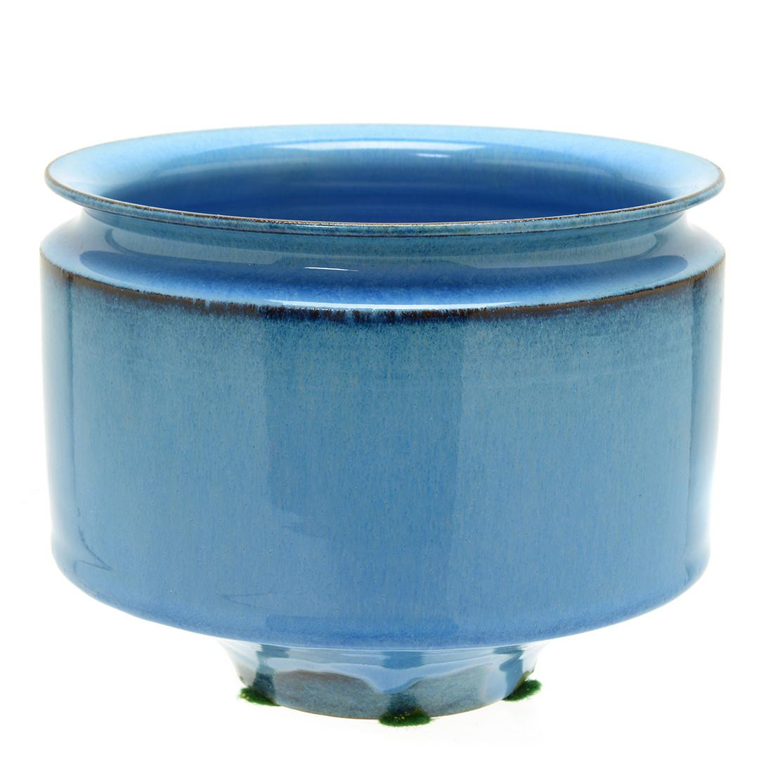 Natzler Pottery Blue Bowl.: Natzler Pottery Blue Bowl. Round light blue bowl with a beveled rim, tapering towards the bottom into a narrow round foot. 'Natzler' in black to the underside. Los Angeles, CA. {Approximate dimensions
