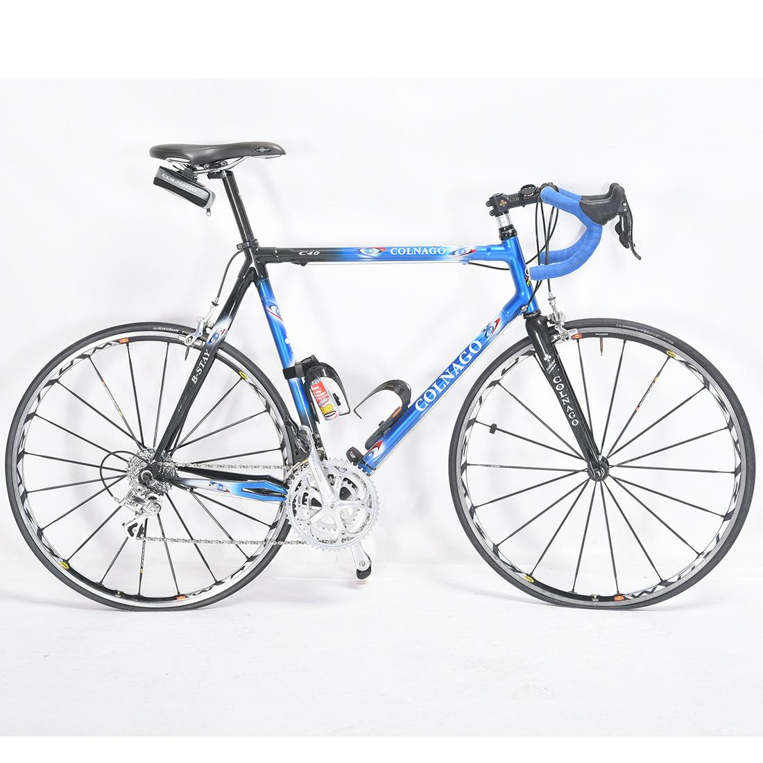 Colnago C40 B-Stay Road Bicycle With Campagnolo: Colnago C40 B-Stay Road Bicycle With Campagnolo Components. Carbon fiber frame, fork, and seatpost; Mavic Ksyrium wheelset, Campagnolo Record brake-set and shifters, Campagnolo Veloce rear derailleur 